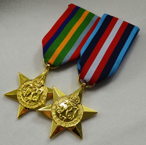 Pair 24ct gold ww2 campaign - of,